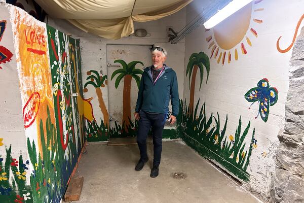 Odd John Resser, Emergency Planning Officer for the municipality, walks in an underground shelter which was previously used by a youth club, in Kongsberg, Norway Thursday, May 8, 2025. (AP Photo/Emma Burrows)
