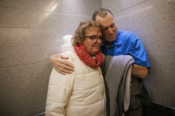 Tim Andrews and his wife, Karen, share an embrace while leaving Massachusetts General Hospital in Boston on Feb. 1, 2025. (Kate Flock/Massachusetts General Hospital via AP)