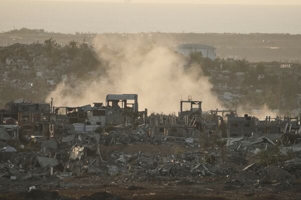 Smoke rises following an Israeli army bombardment in Gaza Strip, seen from southern Israel, Tuesday, May 20, 2025. (AP Photo/Maya Alleruzzo)