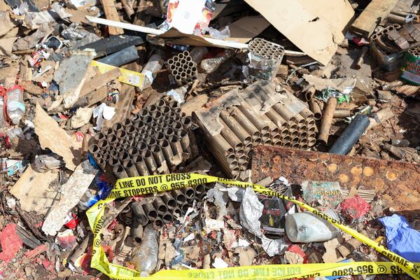 Fireworks debris is seen outside the home where a New Year's Eve fireworks explosion killed and injured people, Wednesday, Jan. 1, 2025, in Honolulu. (AP Photo/Marco Garcia)