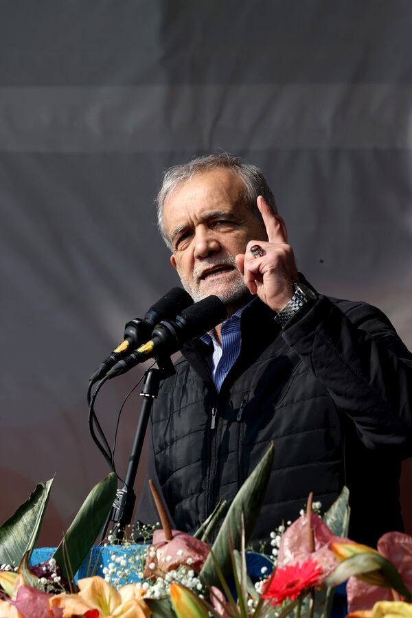 In this photo released by the Iranian Presidency Office, President Masoud Pezeshkian speaks during a rally commemorating anniversary of 1979 Islamic Revolution that toppled the late pro-U.S. Shah Mohammad Reza Pahlavi and brought Islamic clerics to power, in Tehran, Iran, Monday, Feb. 10, 2025. (Iranian Presidency Office via AP)