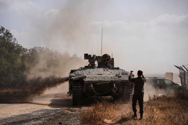 Israeli forces move along the border with the Gaza Strip, in southern Israel, Monday, May 19, 2025. (AP Photo/Ohad Zwigenberg)