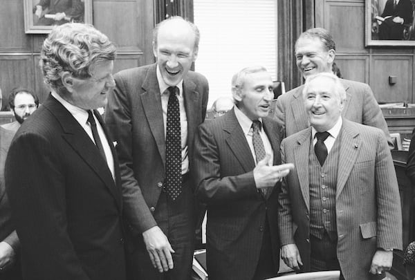 FILE - House Senate conferees meet at the start of their first session on the immigration reform bill on Capitol Hill, Washington, Sept. 13, 1984. From left are, Sen. Edward Kennedy, D-Mass.; Alan Simpson, R-Wyoming, Rep. Romano Mazzoli, D-Ky; Rep. Hamilton Fish, R-N.Y.; Rep. Peter Rodino, D-N.J. Simpson has died at age 93. (AP Photo/Ira Schwarz, File)