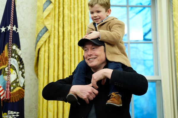 Elon Musk, joined by his son X Æ A-Xii, speaks in the Oval Office at the White House, Tuesday, Feb. 11, 2025, in Washington, during an event with President Donald Trump. (Photo/Alex Brandon)