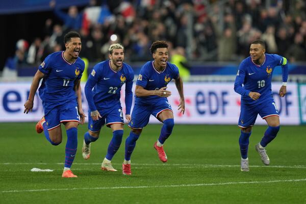 France players celebrate after winning the penalty shootout during the UEFA Nations League quarterfinal second leg soccer match between France and Croatia, at the Stade de France in Saint-Denis, outside Paris, Sunday, March 23, 2025. (AP Photo/Thibault Camus)