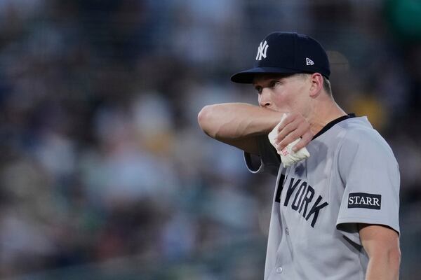 New York Yankees pitcher Will Warren walks to the mound after striking out Athletics' Shea Langeliers during the fourth inning of a baseball game Friday, May 9, 2025, in West Sacramento, Calif. (AP Photo/Godofredo A. Vásquez)