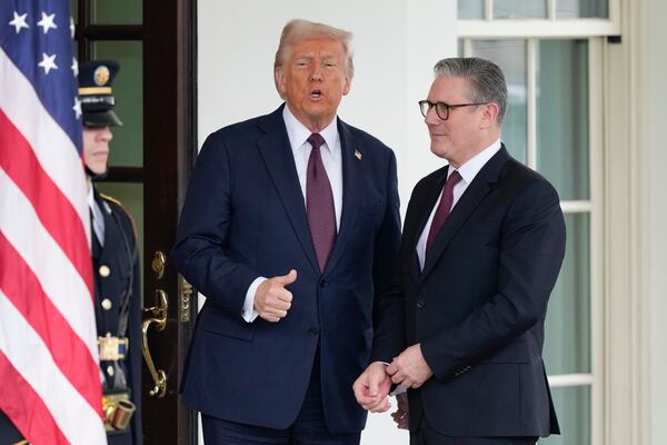 Britain's Prime Minister Keir Starmer is greeted by President Donald Trump as he arrives at the White House in Washington, Thursday, Feb. 27, 2025. (AP Photo/Ben Curtis)