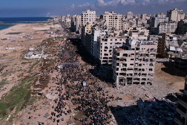 Displaced Palestinians return to their homes in the northern Gaza Strip on Monday, Jan. 27, 2025, following Israel's decision to allow thousands of them to go back for the first time since the early weeks of the 15-month war with Hamas. (AP Photo/Mohammad Abu Samra)