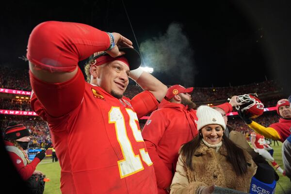 Kansas City Chiefs quarterback Patrick Mahomes celebrates after defeating the Buffalo Bills in the AFC Championship NFL football game, Sunday, Jan. 26, 2025, in Kansas City, Mo. (AP Photo/Charlie Riedel)