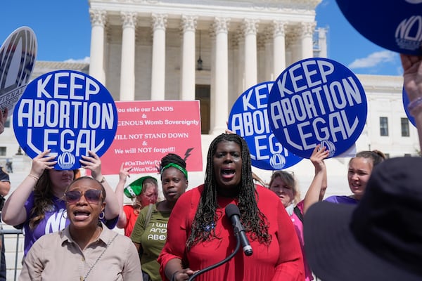 FILE - Christian F. Nunes, president of National Organization for Women speaks as abortion rights activists and Women's March leaders protest as part of a national day of strike actions outside the Supreme Court, Monday, June 24, 2024, in Washington. (AP Photo/Mark Schiefelbein, File)