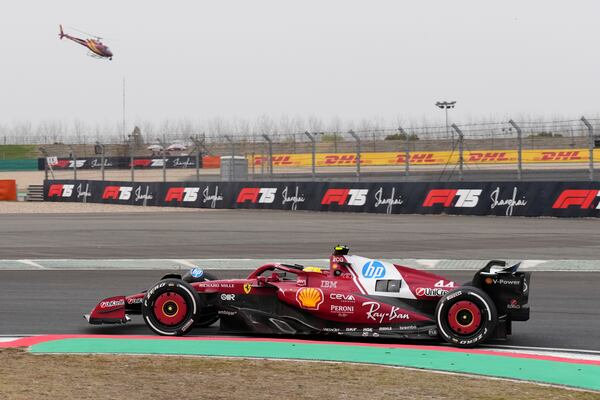 Ferrari driver Lewis Hamilton of Britain steers his car during the Chinese Formula One Grand Prix race at the Shanghai International Circuit, Shanghai, Sunday, March 23, 2025. (AP Photo)