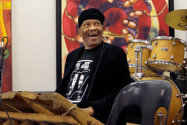 FILE - Jazz musician Roy Ayers, background plays an African Marimba instrument during his workshop with young music artist at Funda Centre in Soweto, South Africa, Friday, Sept. 29, 2017. (AP Photo/Themba Hadebe, File)