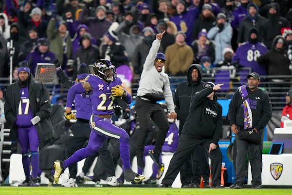 Baltimore Ravens running back Derrick Henry busts a long run against the Pittsburgh Steelers during the second half of an NFL football game, Saturday, Dec. 21, 2024, in Baltimore. (AP Photo/Stephanie Scarbrough)