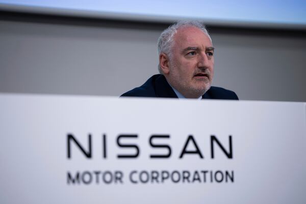Nissan CFO Jeremie Papin attends a press conference to announce 2024 fiscal year financial results in Yokohama, Tuesday, May 13, 2025. (AP Photo/Louise Delmotte)