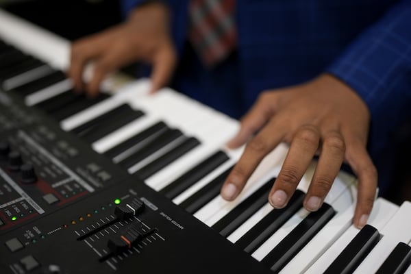 A musician plays the electric piano during rehearsal at Stax Music Academy, Thursday, Jan. 30, 2025, in Memphis, Tenn. (AP Photo/George Walker IV)