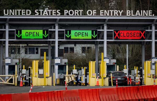 A car waits at the United States and Canada border in Surrey B.C., on Tuesday, March 4, 2025. (Ethan Cairns /The Canadian Press via AP)