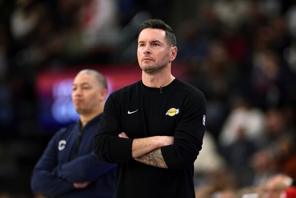 Los Angeles Lakers head coach JJ Redick follows the action from the sideline during the second half against Los Angeles Clippers on Tuesday, Feb. 4, 2025, in Inglewood, Calif. (AP Photo/Kevork Djansezian)