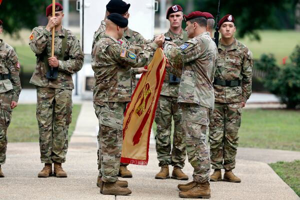 FILE - Lt. Gen. Christopher T. Donahue, front right, takes part of the Casing of the Colors during a renaming ceremony, June 2, 2023, in Fort Liberty, N.C. (AP Photo/Karl B DeBlaker, File)