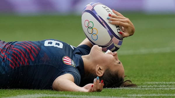 FILE 0- United States' Alex Sedrick reacts after scoring the winning try during the women's bronze medal Rugby Sevens match between the United States and Australia at the 2024 Summer Olympics, in the Stade de France, in Saint-Denis, France, Tuesday, July 30, 2024.. (AP Photo/Vadim Ghirda, File)