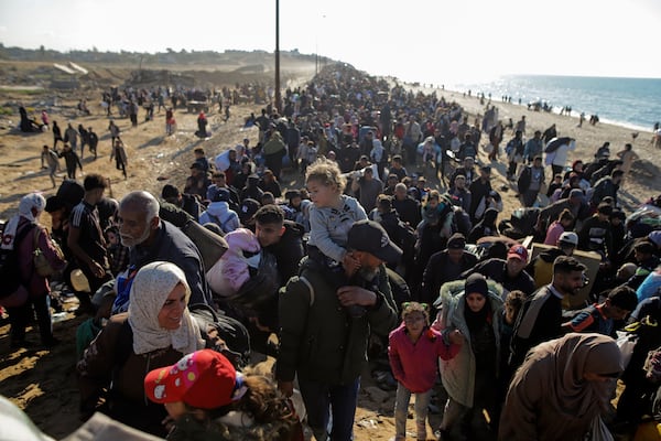 Displaced Palestinians return to their homes in the northern Gaza Strip, following Israel's decision to allow thousands of them to go back for the first time since the early weeks of the 15-month war with Hamas, Monday, Jan. 27, 2025. (AP Photo/Jehad Alshrafi)