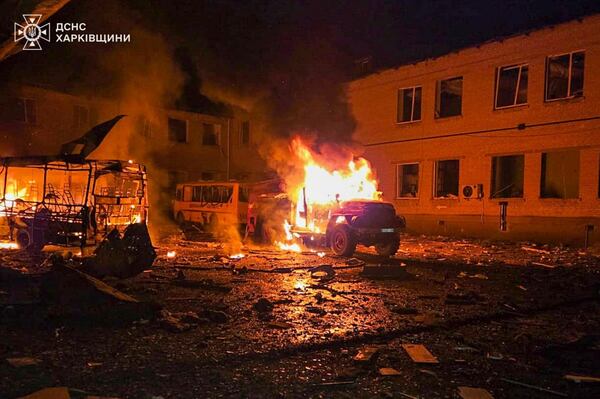 In this photo provided by the Ukrainian Emergency Service, firefighters put out the fire following a Russian drone attack in Kupyansk, Kharkiv region, Ukraine, Thursday, March 20, 2025. (Ukrainian Emergency Service via AP)