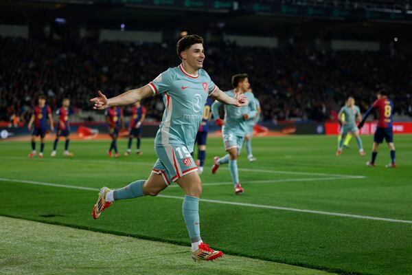 Atletico Madrid's Julian Alvarez celebrates after scoring during a Spanish Copa del Rey, or King's Cup, the semi-final soccer match between Barcelona and Atletico Madrid in Barcelona, Spain, Tuesday, Feb. 25, 2025. AP Photo/Joan Monfort)