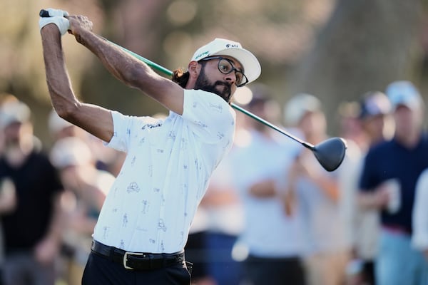 Akshay Bhatia hits his tee shot on the 12th hole during the third round of The Players Championship golf tournament Saturday, March 15, 2025, in Ponte Vedra Beach, Fla. (AP Photo/Chris O'Meara)