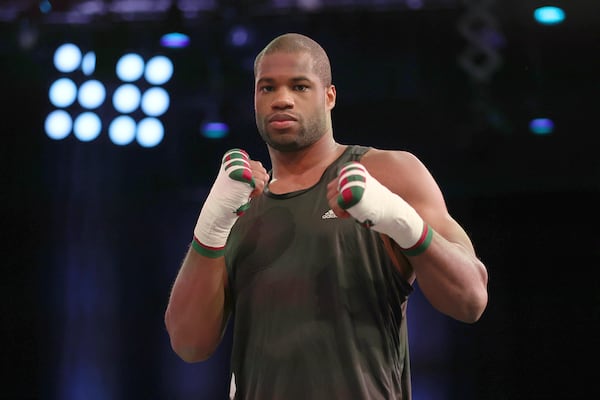 FILE - Britain's Daniel Dubois poses for the cameras after taking part in a boxing workout at the BT Sport studios, QEII Olympic Park in London, Nov. 29, 2022. (AP Photo/Ian Walton, File)