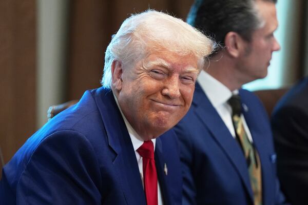 President Donald Trump listens during a cabinet meeting at the White House, Wednesday, April 30, 2025, in Washington. (AP Photo/Evan Vucci)