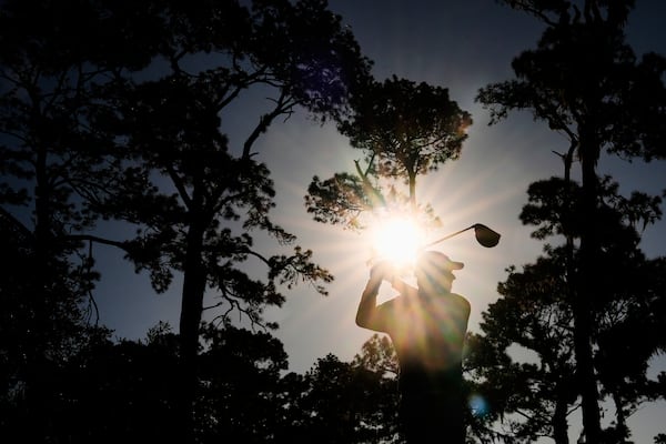 Rory McIlroy, of Northern Ireland, hits from the 16th tee during a playoff round of The Players Championship golf tournament Monday, March 17, 2025, in Ponte Vedra Beach, Fla. (AP Photo/Julia Demaree Nikhinson)