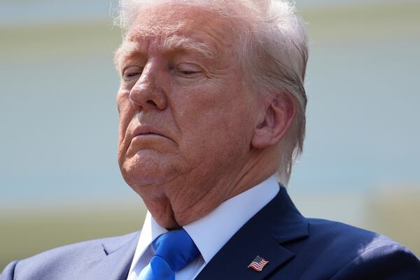 President Donald Trump listens during a National Day of Prayer event in the Rose Garden of the White House, Thursday, May 1, 2025, in Washington. (AP Photo/Evan Vucci)
