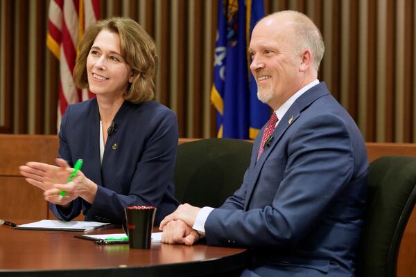 Wisconsin Supreme Court candidates Brad Schimel and Susan Crawford are seen before a debate Wednesday, March 12, 2025, in Milwaukee. (AP Photo/Morry Gash)