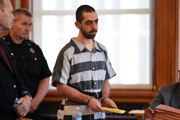 Hadi Matar, center, addresses the court in Chautauqua County court in Mayville, N.Y., Friday, May. 16, 2025. (AP Photo/Adrian Kraus)