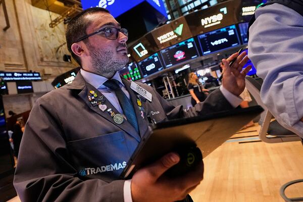 Trader Drew Cohen works on the floor of the New York Stock Exchange, Monday, May 5, 2025. (AP Photo/Richard Drew)
