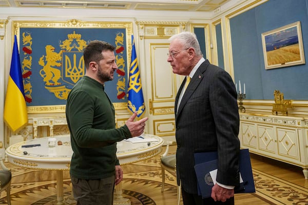 U.S. Special Envoy for Ukraine and Russia Keith Kellogg, right, and Ukraine's President Volodymyr Zelenskyy talk during their meeting in Kyiv, Ukraine, Feb. 20, 2025. (AP Photo/Evgeniy Maloletka)