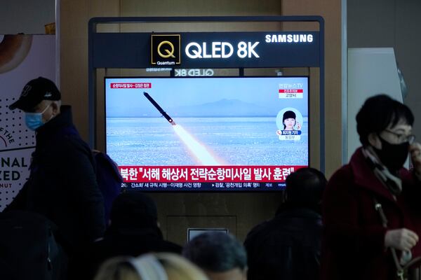 A TV screen shows an image of North Korea's missile launch during a news program at Seoul Railway Station in Seoul, South Korea, Friday, Feb. 28, 2025. (AP Photo/Ahn Young-joon)