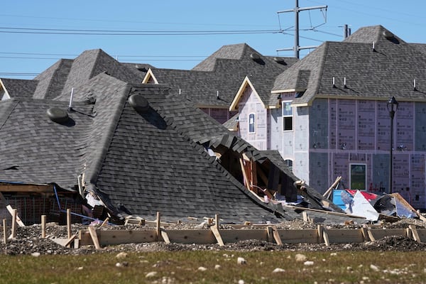 Homes that were under construction sit destroyed after recent severe weather passed through the area in Haslet, Texas, Wednesday, March 5, 2025. (AP Photo/Tony Gutierrez)