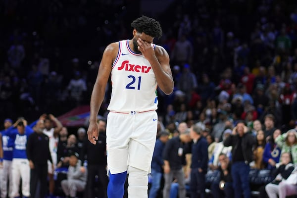 Philadelphia 76ers' Joel Embiid reacts after missing a shot during the second half of an NBA basketball game against the Toronto Raptors, Tuesday, Feb. 11, 2025, in Philadelphia. (AP Photo/Matt Slocum)