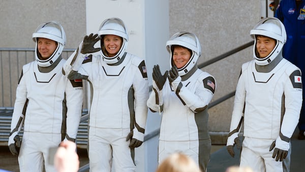 Crew 10, from left, cosmonaut Kirill Peskov, astronaut Nichole Ayers, astronaut Anne McClain and astronaut Anne McClain leave the Operations and Checkout building before heading to Launch Pad 39-A at the Kennedy Space Center in Cape Canaveral, Fla., for a mission to the International Space Station, Wednesday, March 12, 2025. (AP Photo/John Raoux)