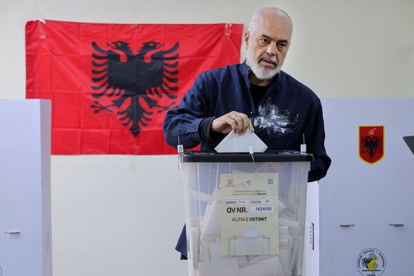 Albania's ruling Socialist party leader Edi Rama casts his ballot during a general election where Rama is seeking a fourth term as Albania's prime minister, in Tirana, Sunday, May 11, 2025. (AP Photo/Vlasov Sulaj)