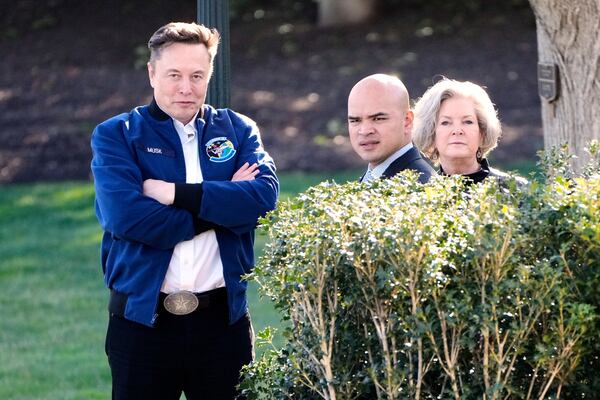 Elon Musk, from left, Walt Nauta and White House chief of staff Susie Wiles depart the White House, Friday, Mar. 21, 2025, in Washington. (AP Photo/Mark Schiefelbein)