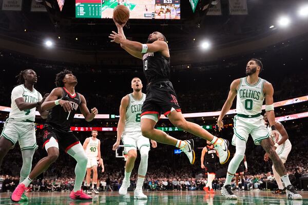 Houston Rockets forward Dillon Brooks (9) drives to the basket against the Boston Celtics during the first half of an NBA basketball game, Monday, Jan. 27, 2025, in Boston. (AP Photo/Charles Krupa)