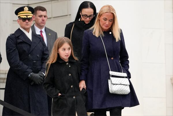 FILE - Vanessa Trump and Chloe Trump arrive before President-elect Donald Trump participates in a wreath laying ceremony at Arlington National Cemetery, Sunday, Jan. 19, 2025, in Arlington, Va. (AP Photo/Evan Vucci,File)