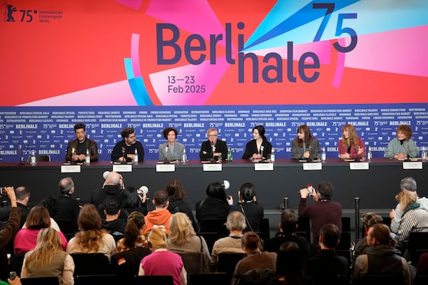 The Film Festival, Berlinale International Jury from left, Nabil Ayouch, Rodrigo Moreno, Maria Schrader, Todd Haynes, Fan Bingbing, Bina Daigeler, Amy Nicholson and the festival Director Tricia Tuttle attend a news conference at the opening day of International Film Festival, Berlinale, in Berlin, Thursday, Feb. 13, 2025. (AP Photo/Ebrahim Noroozi)