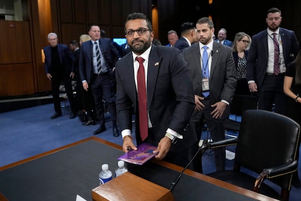 Kash Patel, President Donald Trump's choice to be director of the FBI, departs following a confirmation hearing before the Senate Judiciary Committee at the Capitol in Washington, Thursday, Jan. 30, 2025. (AP Photo/Ben Curtis)