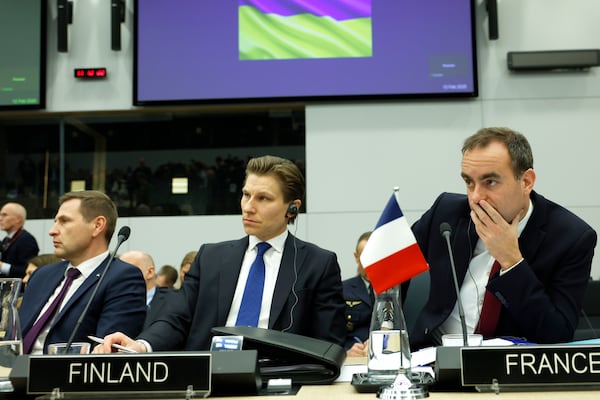 From left, Estonia's Defense Minister Hanno Pevkur, Finland's Defense Minister Antti Hakkanen and French Defense Minister Sebastien Lecornu listen to opening statements during a meeting of the Ukraine Defense Contact group at NATO headquarters in Brussels, Wednesday, Feb. 12, 2025. (AP Photo/Omar Havana)