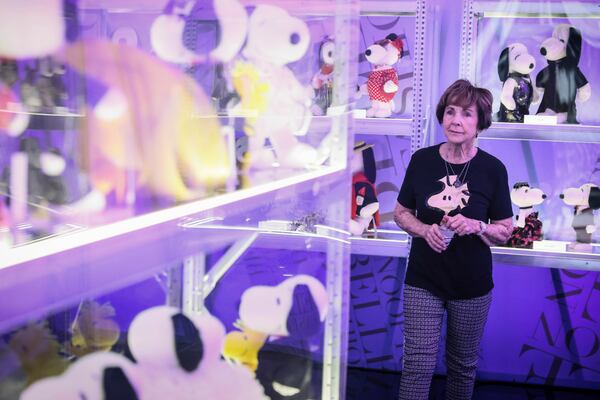 Jeannie Schulz, widow of Charles M. Schulz, tours the Snoopy In Style exhibition that runs from March 22 through April 5, in Paris Thursday, March 20, 2025. (AP Photo/Thomas Padilla)