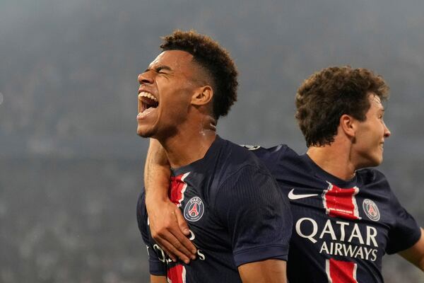 PSG's Desire Doue celebrates after scoring his side's second goal during the Champions League final soccer match between Paris Saint-Germain and Inter Milan at the Allianz Arena in Munich, Germany, Saturday, May 31, 2025. (AP Photo/Matthias Schrader)