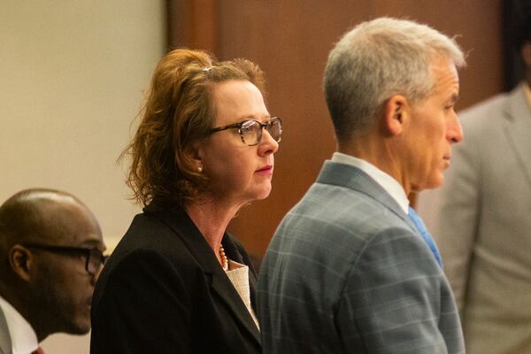 Jackie Johnson stands with her defense lawyer Brian Steel in the first day of her defense in her trial on the single remaining charge of violating her oath of office, Tuesday, Feb. 4, 2025, in Brunswick, Ga. (Terry Dickson/The Brunswick News via AP, Pool)