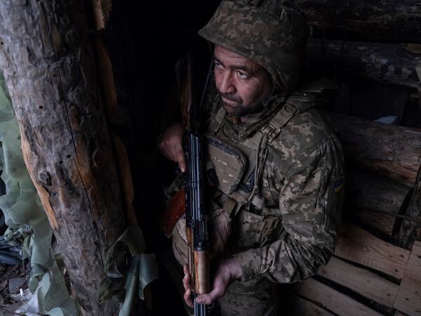 FILE - In this photo provided by Ukraine's 93rd Kholodnyi Yar Separate Mechanized Brigade press service, a soldier looks out of a shelter on the anti-drone firing position in Kostyantynivka, the site of the heavy battles with the Russian troops in the Donetsk region, Ukraine, April 24, 2025. (Iryna Rybakova/Ukraine's 93rd Mechanized Brigade via AP, File)